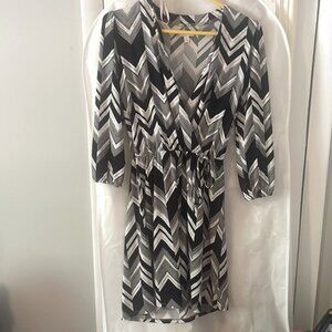 Charming Charlie’s Womens T length wrap style dress.